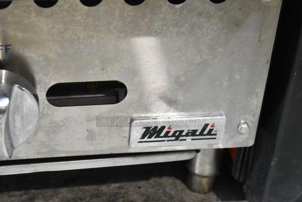 Migali stainless steel gas charbroiler grill with control knob and logo. Used condition. Ideal for commercial use.