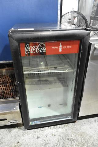 Imbera VR06 metal commercial mini cooler, single door, Coca-Cola logo, 115V, 1 phase, visible wear, labeled "Imbera."