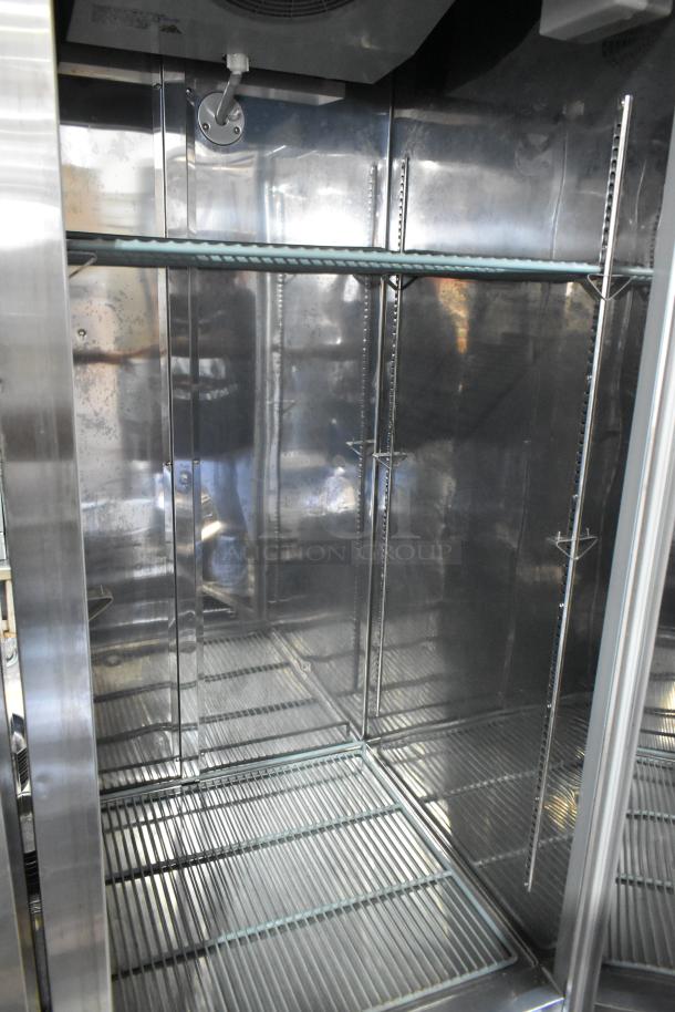 Universal Coolers RIFI-30 stainless steel commercial freezer, single door, poly coated racks, on commercial casters.