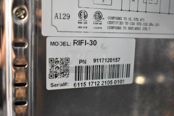 Universal Coolers RIFI-30 stainless steel freezer label showing model, serial number, and certification markings.
