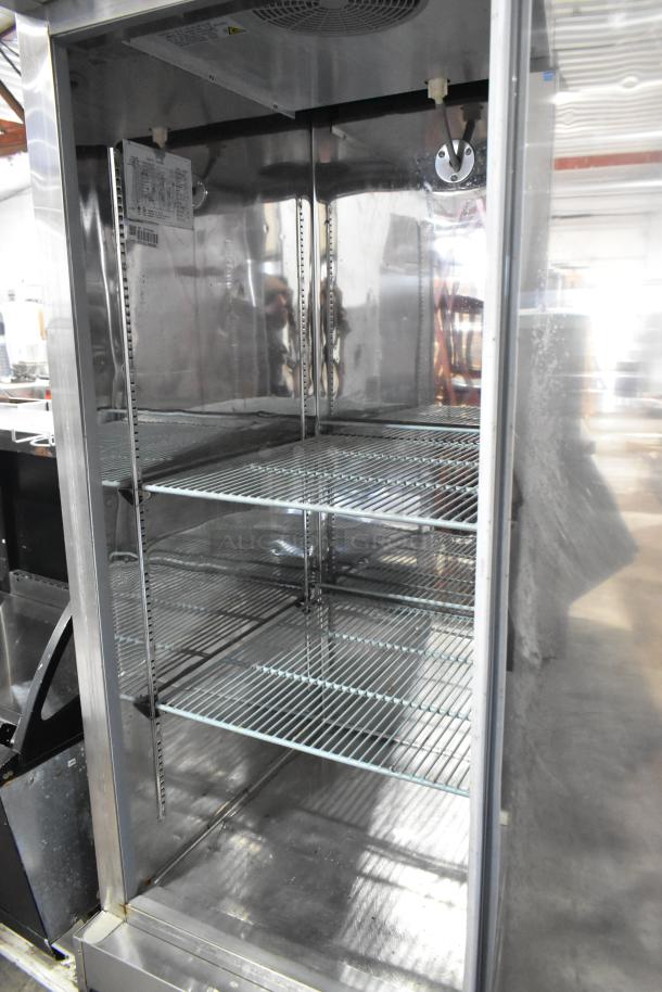 Universal Coolers RICI-30 stainless steel commercial single door cooler with poly-coated racks, on commercial casters.