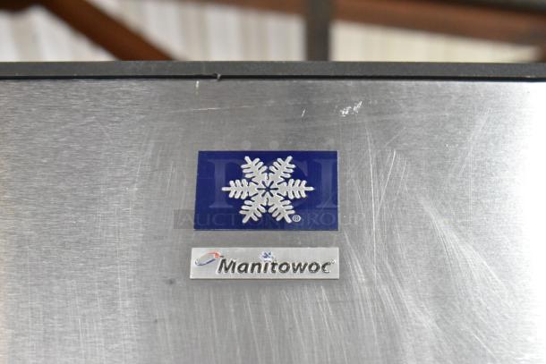 Manitowoc SY1805W stainless steel ice head on bin. Features brand logo and model label. 208-230V, 1 Phase.