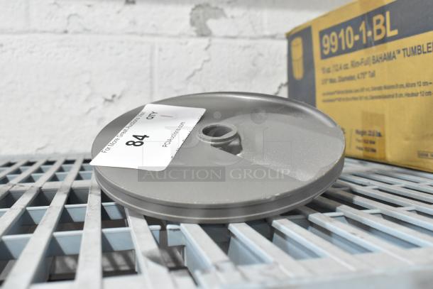 BRAND NEW SCRATCH AND DENT! Robot Coupe E10 S3/8 metal slicing blade, slightly marked, with auction tag visible.