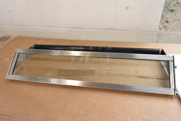 Brand new metal access door for conveyor pizza oven, featuring stainless steel frame. Scratch and dent condition.