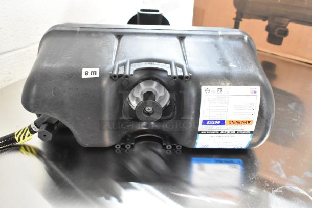 BRAND NEW Flushmate M-101526-F3A 1.6 GPF system with push button. Slight scratches, dent, visible label, and caution markings.