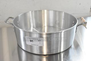 Brand new Town 34616 18 Qt. aluminum steamer water pan with handles, minor dents, and auction label "91".