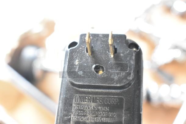 Brand new Bar Maid A-200 bar glass washer plug. Tower Mfg. Corp label visible, 115 volts, 1 phase, scratch and dent condition.
