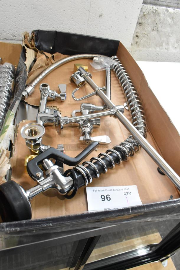 Brand new spray nozzle attachment, chrome finish, includes hoses and fittings, slight scratches and dents, item 96.