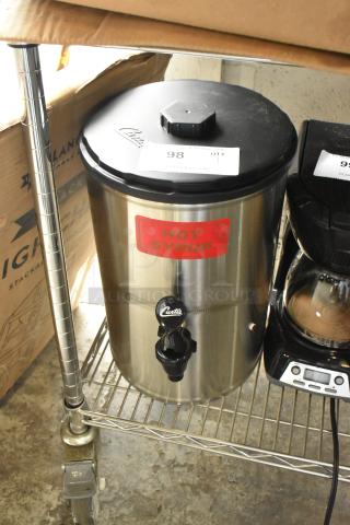 Brand new Curtis SW-2 stainless steel 2-gallon syrup warmer, 120V. Visible "Hot Syrup" label and Curtis logo on the spout.