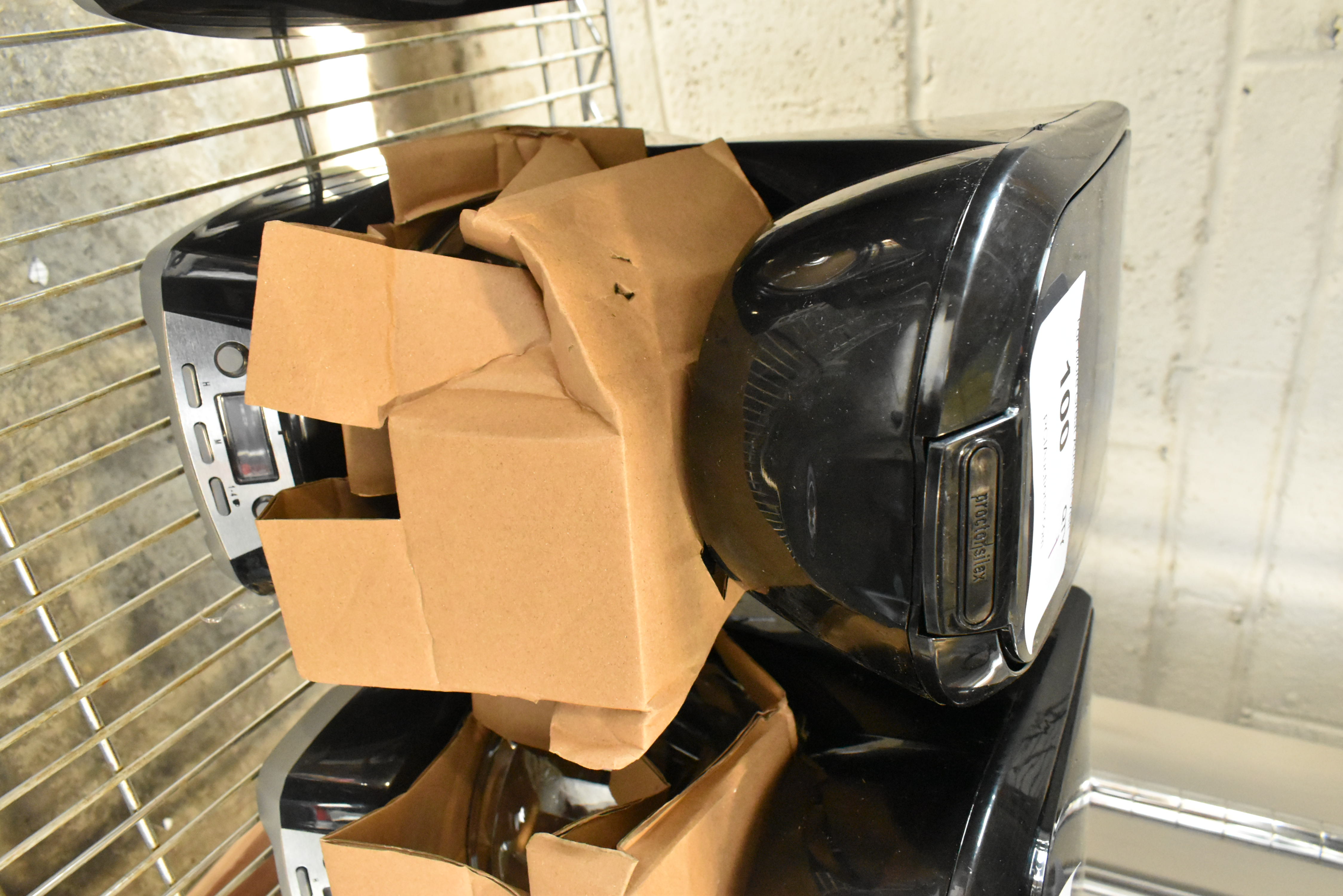 Residential coffee maker showing plastic construction