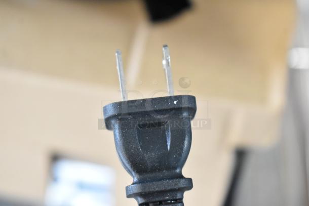Close-up of a power plug for a Proctor Silex 43672PS 12-Cup Programmable Drip Coffee Maker. Model 43672PS.