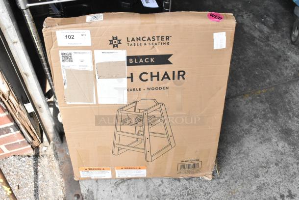 Brand new Lancaster wooden high chair, black finish, model 164WHCKDBK, unassembled, in original packaging.