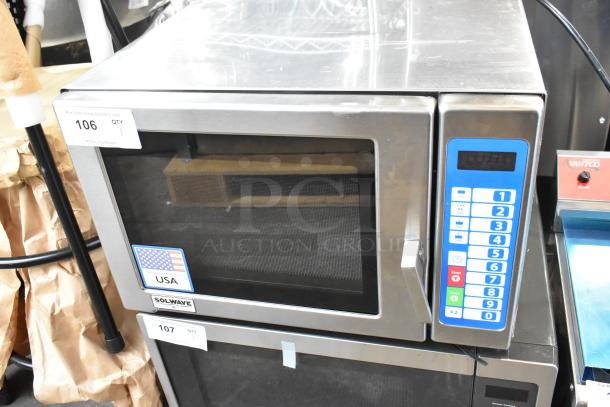 BRAND NEW 2025 Solwave SWA18T Ameri-Series stainless steel commercial microwave, push button controls, 208/240V, marked "USA".