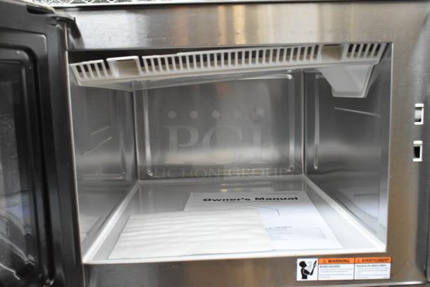 Brand new 2025 Solwave SWA18T stainless steel commercial microwave, medium-duty, push button controls, with manuals included.