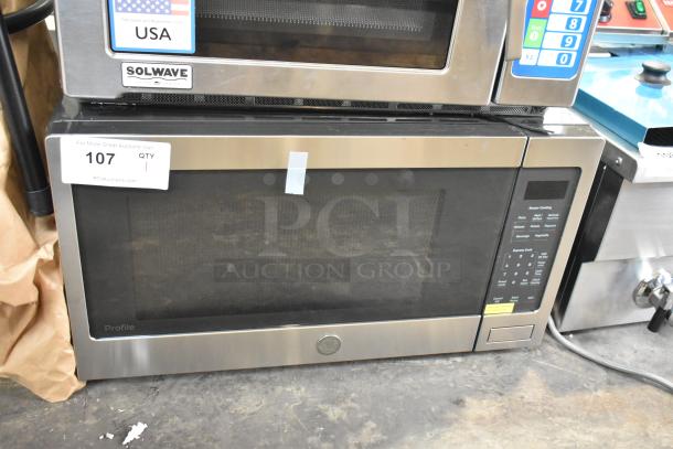 Brand new 2025 GE PCST22U1W1SS microwave, stainless steel, scratch and dent, digital controls, includes plate.
