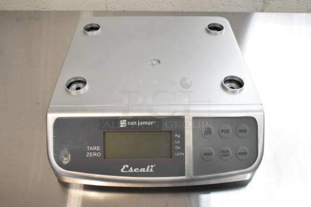 San Jamar Escali SCDGM66 digital kitchen scale, 66 lb. capacity, new scratch and dent, features buttons and LCD display.