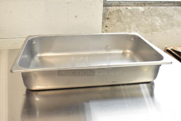 5 brand new Vigor full-size 4" deep anti-jam stainless steel steam table pans, shown on a reflective surface.
