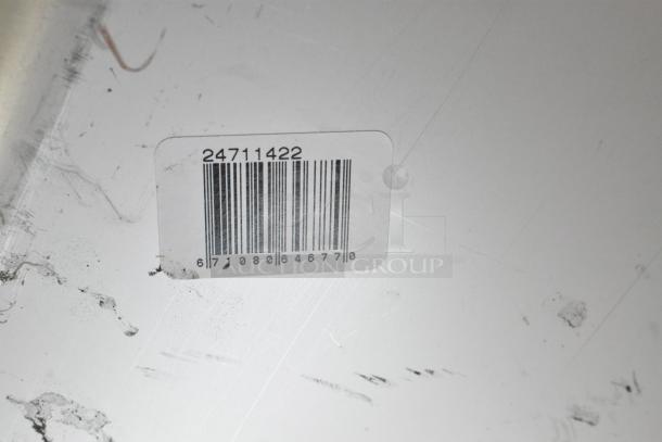 Barcode label showing item number 24711422 on a scratch-marked surface.