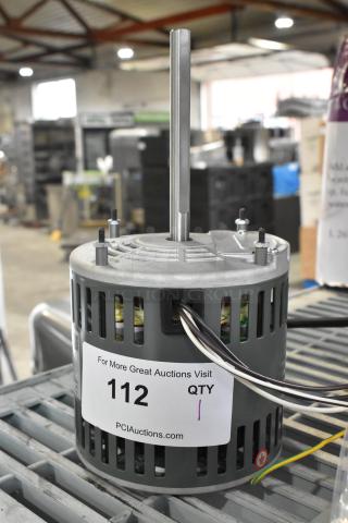 Brand new East West YDK140/20-2-75B1 motor, 208-240V, 1 phase, with minor scratches and dents. Auction tag visible.
