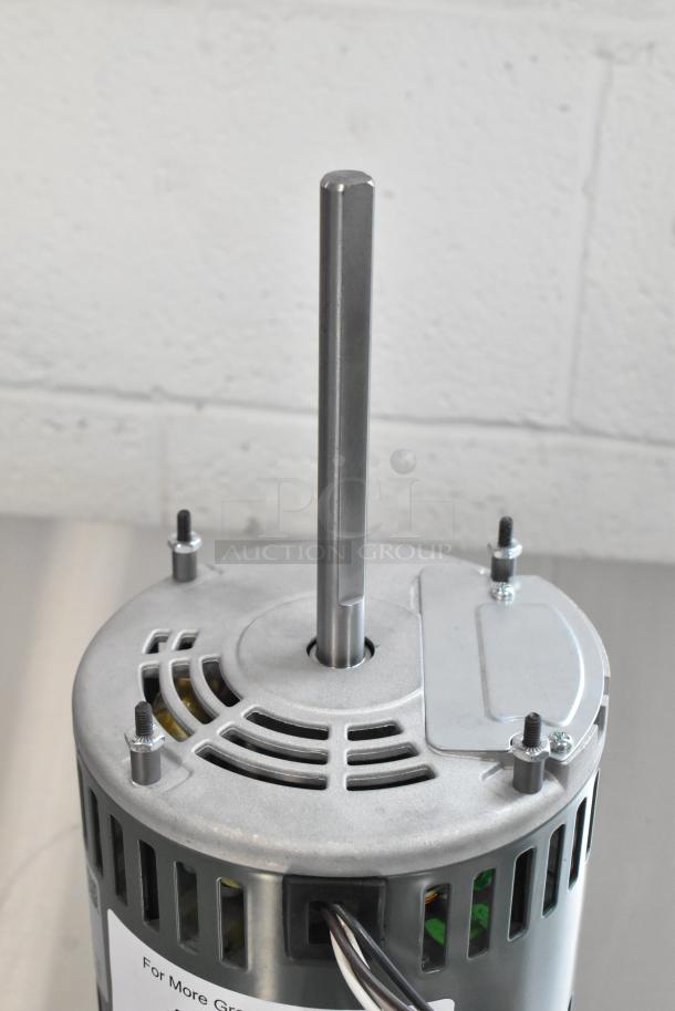 Brand new East West YDK140/20-2-75B1 motor, 208-240V, 1 phase, visible scratch and dent, detailed top view.