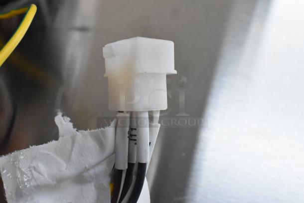 BRAND NEW East West YDK140/20-2-75B1 Motor connector, 208-240V, 1 Phase, slight scratches, visible wiring and plastic connector.