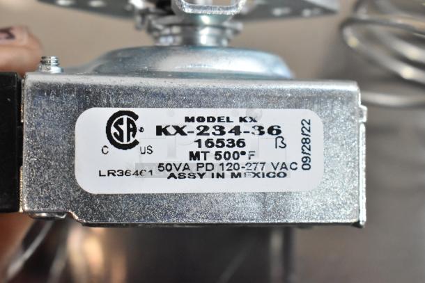 Close-up of KX-234-36 model label on metal burner, rated 500°F, 50VA, 120-277VAC, assembled in Mexico.