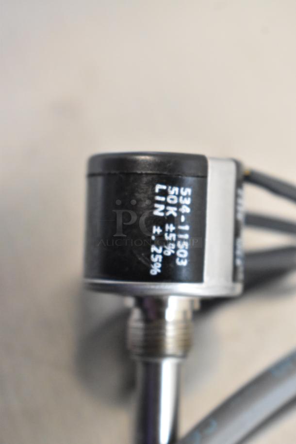 Brand new scratch and dent item with visible labeling "534-11503, 50K ±5% LIN ±25%". Part of a 4-item auction lot.