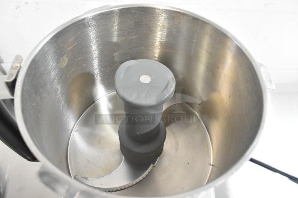 Brand new Robot Coupe Blixer 4 food processor, 4.7 Qt stainless steel bowl, S blade visible, commercial grade, minor scratches.