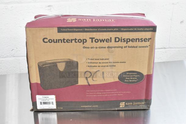 3 new San Jamar T1740SS towel dispensers in original packaging. Stainless steel look, slight box wear, holds C-fold towels.