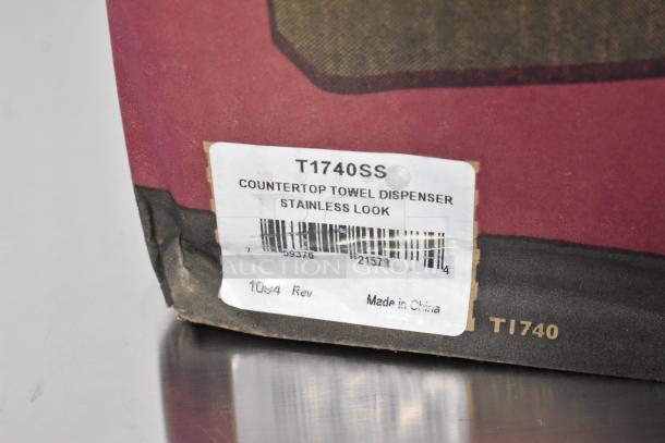 San Jamar T1740SS countertop towel dispenser in packaging, labeled "stainless look," shows scratch and dent condition.