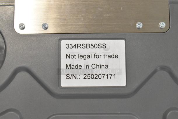 BRAND NEW AvaTek 334RSB50SS digital scale, 50 lb capacity, built-in handle, scratch and dent condition. Label: Not legal for trade.