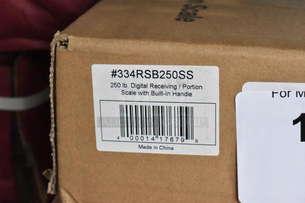 New AvaWeigh RSB250SS 250 lb. digital scale box with barcode, made in China label, built-in handle feature.