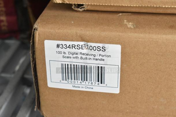 AvaTek 334RSB100SS 100 lb. digital scale box, built-in handle, barcode label, minor scratch on cardboard corner.