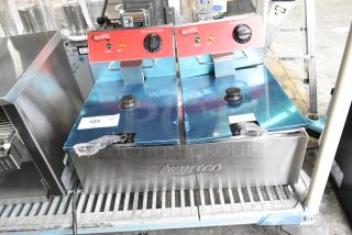 Brand new Avantco 177F102 20 lb. dual tank electric fryer, scratch and dent, with 2 baskets, 2 lids. 120V, 1 phase.
