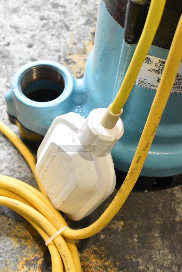 BRAND NEW HT-6EN-CIA-FS submersible pump, 115V, 1 phase, blue with yellow cords. Scratch and dent condition.