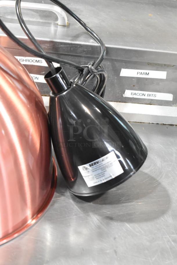BRAND NEW ServIt 423HLS85CR heat lamp with copper finish round dome shade, 8' length, scratch and dent condition.