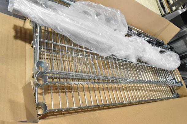 Brand new Omar 21823 wire shelves in box, minor scratches, chrome finish, sturdy construction, wrapped in plastic.
