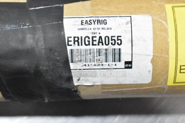 Label on ERIGEA055 umbrella with holder, part of auction lot including Westcott Basics.