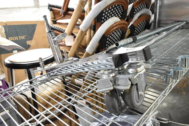 Kupo Commercial Casters on metal shelving, featuring durable gray wheels and metal brackets, ideal for heavy-duty use.