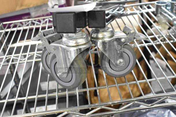 Kupo Commercial Casters on a metal rack. Features rubber wheels, metal frame, and robust construction. Excellent condition.