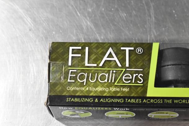 Box of Flat Table Equalizers, brand new, contains 4 equalizing table feet. Stabilizes and aligns tables.