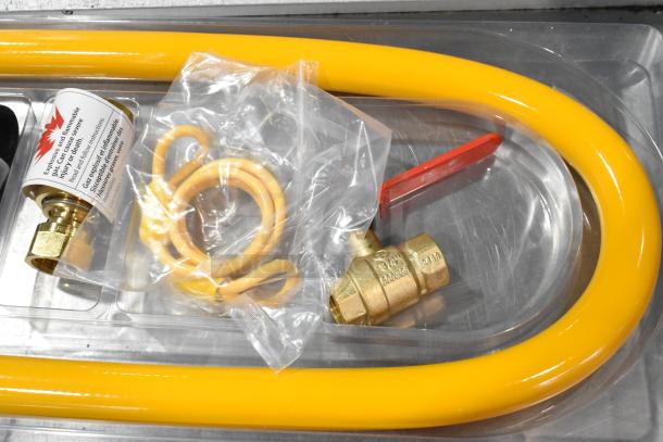 Brand new Regency 600GKM3448 48" mobile gas connector hose kit with elbows, valve, device, and quick disconnect, yellow.