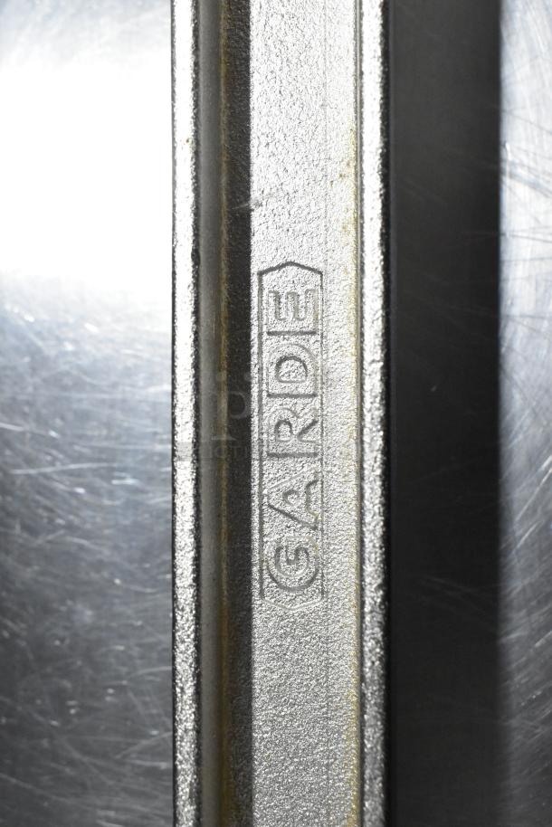 BRAND NEW SCRATCH AND DENT! Garde 407 Metal Commercial Can Opener with visible Garde logo, showing durable metal construction.