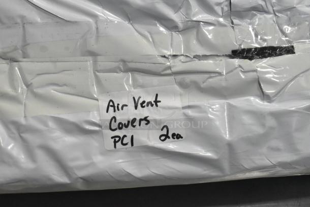 Brand new air vent covers, scratch and dent condition, labeled "Air Vent Covers PCI 2ea."