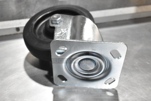 Lot of 8 commercial casters, brand new with minor scratches. Model 351302090155. Durable metal base, rubber wheel.