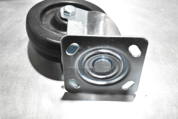 Lot of 8 brand new commercial casters, model 351302090155, showing a metal plate and black wheel. Slight scratches.