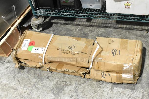2 Advance Tabco AB2-18 end-mounted shelving systems in damaged boxes. Labels show "18" Chrome Wire Brackets, Model: AB2-18".
