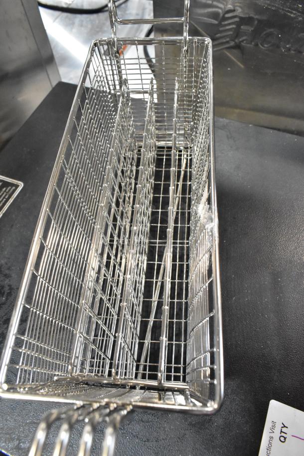 Brand new metal fry baskets with slight scratches, tall rectangular shape, durable wire mesh design, ideal for commercial use.