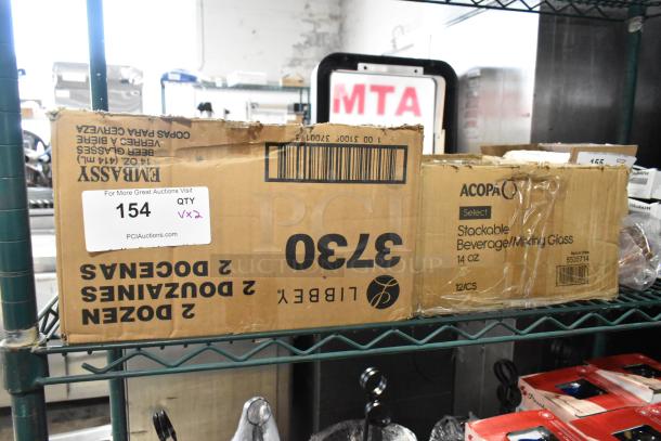 Box of Acopa Select 14 oz. Stackable Beverage/Mixing Glasses, model 5535714. New, scratch and dent condition.