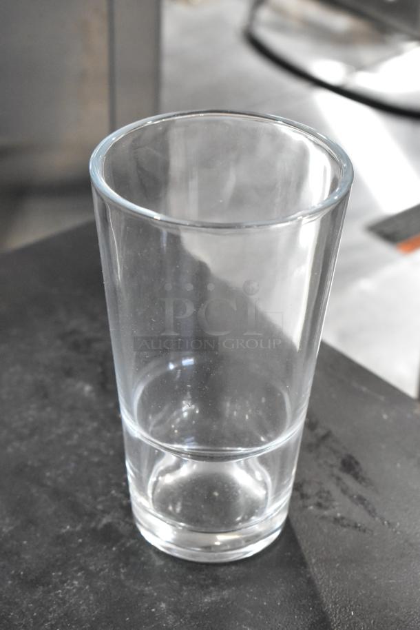 Acopa Select 14 oz. Stackable Beverage Glass, brand new, slight scratch and dent, clear, sturdy design.